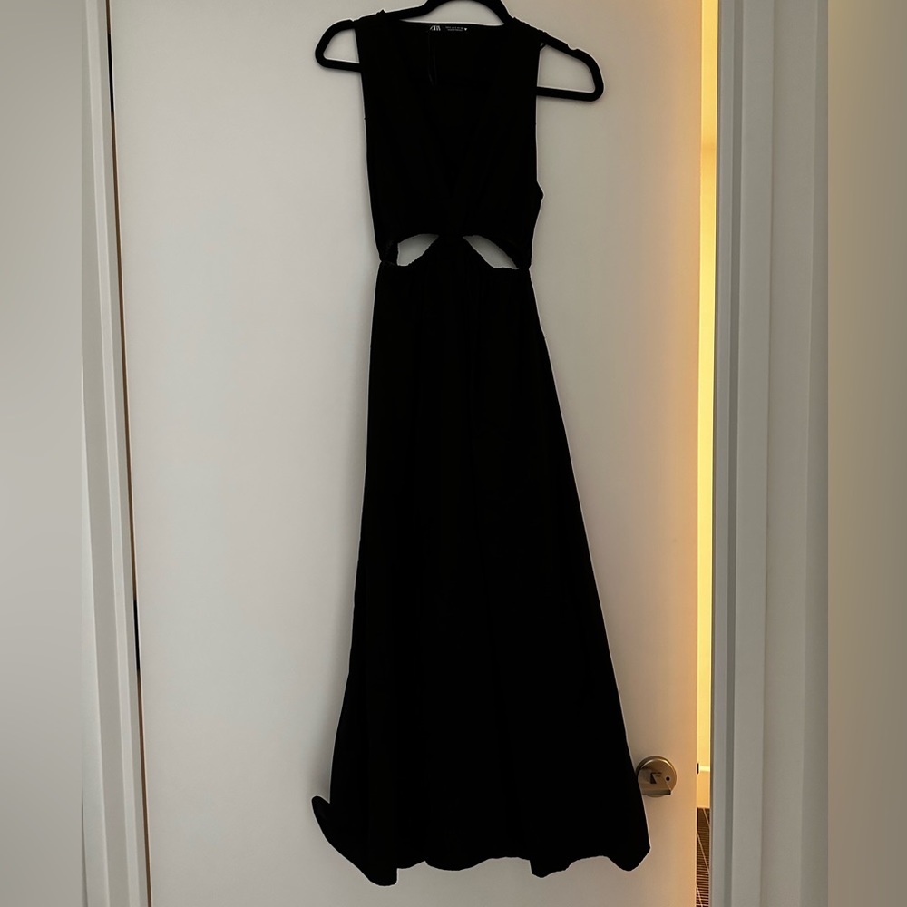 Black cotton poplin cut-out dress.